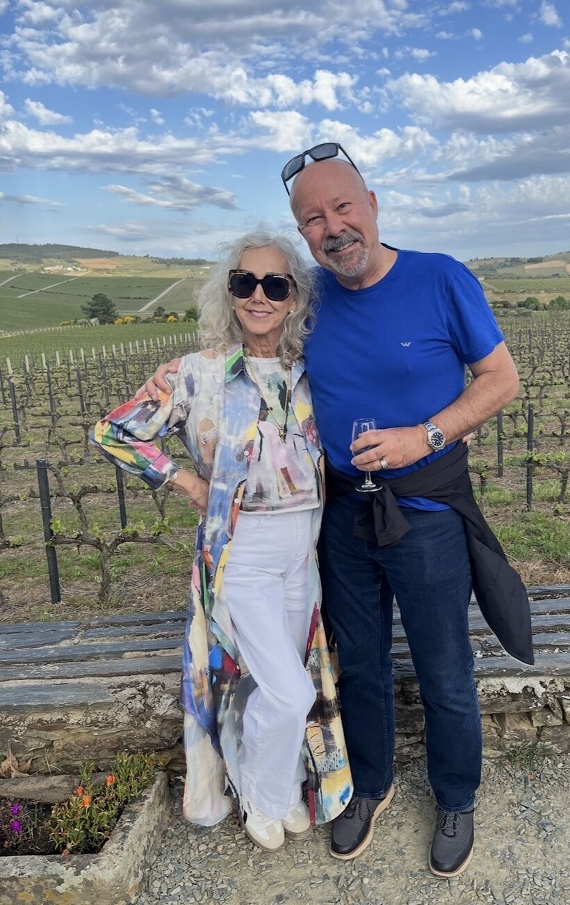 John Gormley with a companion visiting a vineyard